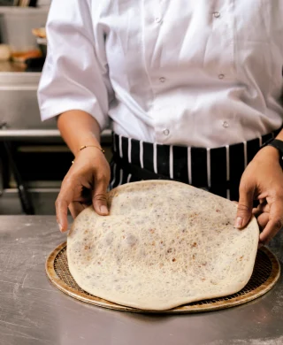 Naan, a symbol of hospitality and warmth, is a staple bread of the Indian cuisine.
Witness our chef transforming a simple dough into a masterpiece.

The rhythmic motion of the rolling pin, the gentle pressure applied, and the precision of each stroke reflect years of practice and dedication that have gone into mastering this ancient craft.

Savor our freshly baked naan, served hot and fluffy, ready to be enjoyed with your favorite Indian dishes.

Order yours now at: www.itsmirchi.com.au

#brisbaneeats #indianfood #delicious #glutenfree #glutenfreeaustralia #glutenfreebrisbane #brisbanedinner #vegan #glutenfreerecipes #glutenfreeeats #organic #nutfree #foodporn #foodphotography #easyvegan #dairyfree #dairyfreerecipes #dairyfreeglutenfree #daairyfreefood
#dairyfreelife #certifiedorganic #paddington4064 #paddingtonbrisbane #staffordbrisbane #queenslandfoodies #queenslandlife #queenslandfood #finediningrestaurant #finediningfood #explore